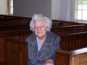 Mrs Newell in East Church pew: photoby Mary Campbell
